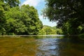 Beautiful summer landscape with river, forest, sun and blue skies. Natural colorful background. Jihlava River. Czech Republic - Royalty Free Stock Photo