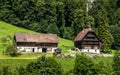 A beautiful summer landscape with two nice houses, located at the foothill of the Alps in Engelberg, Switzerland. Royalty Free Stock Photo