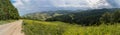 Beautiful summer panorama of the road in Altai Mountains Royalty Free Stock Photo