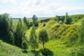 Beautiful summer quarry with green grass and trees