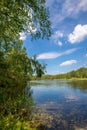 Beautiful summer rural landscape with a lake on a sunny day Royalty Free Stock Photo