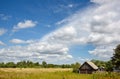 Beautiful summer rural landscape with old barn