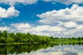 Beautiful summer rural landscape with river and clouds on the blue sky. Russia. Ural. Village Sloboda Royalty Free Stock Photo