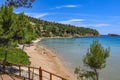 Beautiful Summer scenery with a lot of swimmers at Chrisi Milia beach in Alonissos island, Greece Royalty Free Stock Photo