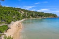 Beautiful Summer scenery with a lot of swimmers at Chrisi Milia beach in Alonissos island, Greece Royalty Free Stock Photo