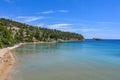 Beautiful Summer scenery with a lot of swimmers at Chrisi Milia beach in Alonissos island, Greece Royalty Free Stock Photo