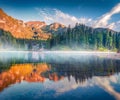 Magnificent summer view of Braies Lake. Misty morning scene of Dolomite Alps, Naturpark Fanes-Sennes-Prags, Italy Royalty Free Stock Photo