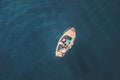 Beautiful summer seasonal photograph. Small boat in the archipelago with lots of colors and lights. Photo taken from above. Marine