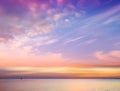 Sky pink orange lilac evening sunset  fluffy   dramatic clouds reflection on sea  water  beautiful  nature landscape Royalty Free Stock Photo