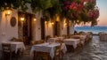 Beautiful summer street cafe the evening in Greece terrace Royalty Free Stock Photo