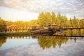 Beautiful summer sunny landscape, lake view with reflection of a blue sky with clouds, forest background Royalty Free Stock Photo