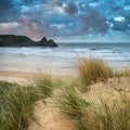 Beautiful Summer sunrise landscape over yellow sandy beach