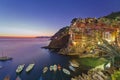 Beautiful summer sunset at Riomaggiore fishing village from Cinque Terre Royalty Free Stock Photo