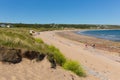 Beautiful summer sunshine and warm weather drew visitors to the beach at Port Eynon, The Gower, Wales Royalty Free Stock Photo