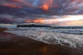 Beautiful summer view seascape. The wet sand on the sea coast. Unbelievable sunrise. Morning landscape. Waves with foam. Romantic Royalty Free Stock Photo