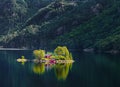 Beautiful summer view of small island with typical Norwegian building on Lovrafjorden flord, North sea. Colorful morning view in