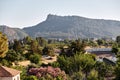 Beautiful summer view from the terrace of villa at the mountains and palms on a bright sunny day. Summer vacation Royalty Free Stock Photo