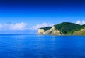 Beautiful summertime panoramic seascape. View of the crystal clear azure sea bay and limestone cliffs. Agios Stefanos cape. Ag. S