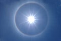 Beautiful sun halo on clear blue sky Royalty Free Stock Photo