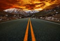 Beautiful sun rising sky with asphalt highways road against sno Royalty Free Stock Photo