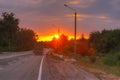 Beautiful sun rising sky with asphalt highways road in rural scene Royalty Free Stock Photo