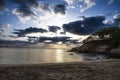 Streaming sun through clouds as sun is setting on Tarrafal beach Cape Verde Royalty Free Stock Photo