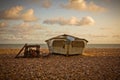 Boat in sunset close to the Brighton pier