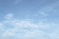 Beautiful sunny blue sky background with white clouds in tropical summer sunlight Royalty Free Stock Photo