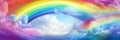 Beautiful sunny summer blue sky panoramic rainbow - fluffy clouds with a giant arcing rainbow against a beautiful