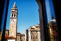 Beautiful sunny summer day view of tower with old clock in Venice - Italy Colorful blue sky Royalty Free Stock Photo