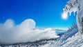 Beautiful sunny winter landscape in thÃÆ mountains. Mountain and fir trees covered with snow Royalty Free Stock Photo