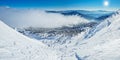 Beautiful sunny winter landscape in thÃÆ mountains. Mountain and fir trees covered with snow and clouds Royalty Free Stock Photo