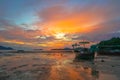 beautiful sunrise above fishing boats on the beach Royalty Free Stock Photo