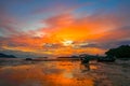 beautiful sunrise above fishing boats on the beach Royalty Free Stock Photo