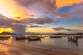 beautiful sunrise above fishing boats on Rawai beach, Royalty Free Stock Photo