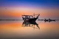 Beautiful Sunrise Boat in seaside with red and dark sky. Dammam -Saudi Arabia