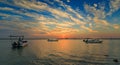 Beautiful Sunrise Boat in seaside with red and dark sky. Dammam -Saudi Arabia Royalty Free Stock Photo