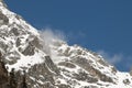 Beautiful sunrise in Caucasus mountains in winter. Mountain ridges highlighted the low winter sun. Royalty Free Stock Photo