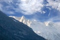 Beautiful sunrise in Caucasus mountains in winter. Mountain ridges highlighted the low winter sun. Royalty Free Stock Photo