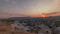 Beautiful sunrise with colorful hot air balloons take off and flying in clear morning sky aerial timelapse in Cappadocia Royalty Free Stock Photo