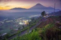 Beautiful sunrise of Dieng with longexposure light painting on the roads.