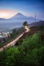 Beautiful sunrise of Dieng with longexposure light painting on the roads.
