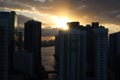 Beautiful sunrise in downtown miami. the sun breaks through the clouds and skyscrapers. view from the 38th floor