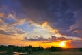 Beautiful sunrise and dramatic clouds on the sky. Royalty Free Stock Photo