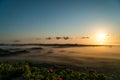 Sunrise in the dunes of Hvide Sande with fog in the valley