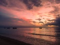 Beautiful sunrise,fishing boat and sea background.