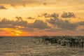 Beautiful sunrise and giant trap fish at Pakpra canal, Pattalung Royalty Free Stock Photo