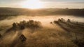 Beautiful sunrise image of drone aerial view of Autumn Fall forest scene landscape Royalty Free Stock Photo