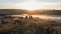 Beautiful sunrise image of drone aerial view of Autumn Fall forest scene landscape Royalty Free Stock Photo