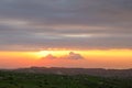 Beautiful sunrise of Judean Desert wadi, with sun rays breaking through clouds over the dry riverbed of Nahal Dragot popular Royalty Free Stock Photo